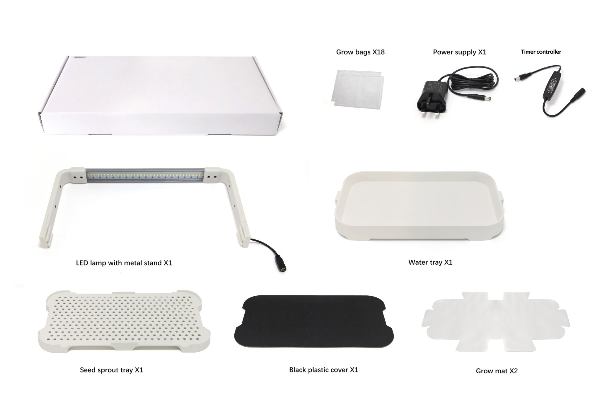Box contents for the white microgreen garden system laid out in a grid. Includes power adapter, LED light in a plastic stand, grow mats, grow bags, handheld controller, water and sprout trays, and a black plastic cover.