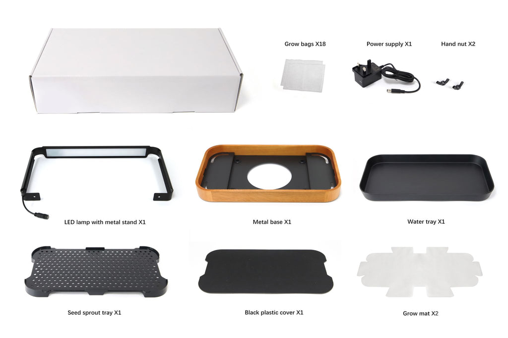 Box contents for the premium bamboo microgreen garden system laid out in a grid. Includes power adapter, LED light in a metal stand, bamboo and metal base plate, grow mats, grow bags, wing nuts, water tray, sprout tray and a black plastic cover.