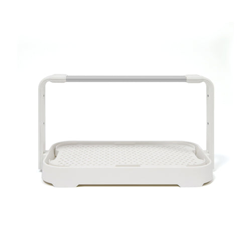 Entry-level white microgreen starter garden system with LED grow light used for indoor gardening.